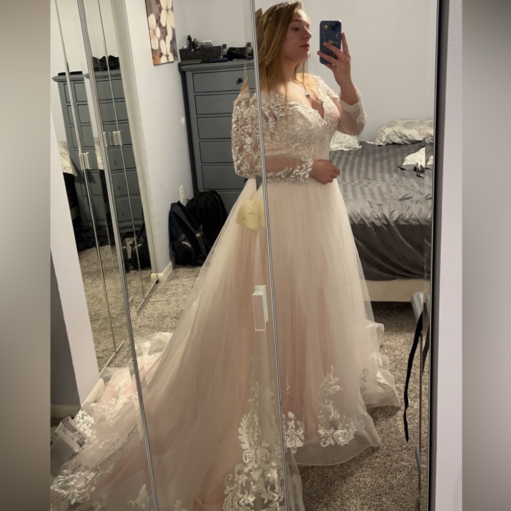 Blush colored wedding dress.